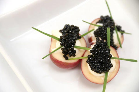 Baby Red Potatoes with Black Caviar and Crème Fraiche