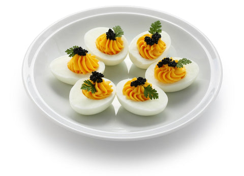 deviled eggs topped with Siberian caviar