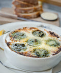 Cooked french escargot in dish